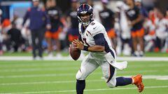 INGLEWOOD, CALIFORNIA - OCTOBER 17: Russell Wilson #3 of the Denver Broncos looks to pass during the first half against the Los Angeles Chargers at SoFi Stadium on October 17, 2022 in Inglewood, California.   Harry How/Getty Images/AFP