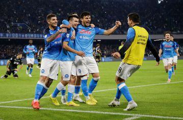 Lozano (second left) celebrates scoring Napoli's penalty.
