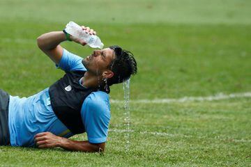 Manchester City taking a water break during training in Beijing, China...it won't be so hot in England.