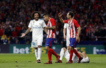 Marcelo complaining at Correa after the Argentinian player kicked Benzema's head with ball.
