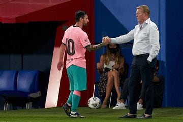 Lionel Messi shakes hands with new Barcelona boss Ronald Koeman after being substituted during the Blaugrana's pre-season friendly with Girona.