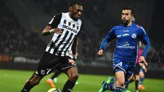 Angers&#039; Cameroonian forward Karl Toko Ekambi (L) vies with Strasbourg&#039;s French midfielder Pablo Martinez (R) during the French L1 Football match between Angers (SCO) and Strasbourg (RCSA), on April 7, 2018 in Raymond-Kopa Stadium, in Angers, nor