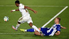 MADRID, SPAIN - JULY 10: Rodrygo (L) of Real Madrid is tackled by Rodrigo Ely of Alaves during the Liga match between Real Madrid CF and Deportivo Alaves at Estadio Alfredo Di Stefano on July 10, 2020 in Madrid, Spain. (Photo by Denis Doyle/Getty Images)
