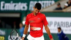 Tennis - French Open - Roland Garros, Paris, France - June 1, 2022  Serbia's Novak Djokovic reacts during his quarter final match against Spain's Rafael Nadal REUTERS/Gonzalo Fuentes