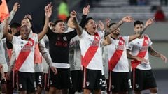 Players of River Plate celebrate with the crowd after defeating Boca Juniors 2-1 in their Argentine Professional Football League match match at the Monumental stadium in Buenos Aires, on October 3, 2021. - River won 2-1. (Photo by Alejandro PAGNI / AFP)