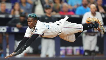 MIAMI, FLORIDA - JUNE 09: Jazz Chisholm Jr. #2 of the Miami Marlins slides home safely to score a run during the fifth inning against the Washington Nationals at loanDepot park on June 09, 2022 in Miami, Florida. (Photo by Michael Reaves/Getty Images)