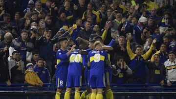 Boca Juniors' midfielder Juan Ramirez (20) celebrates with teammates after scoring the team's second goal against Defensa y Justicia during their Argentine Professional Football League quarterfinal match at La Bombonera stadium in Buenos Aires, on May 10, 2022. (Photo by Juan MABROMATA / AFP)