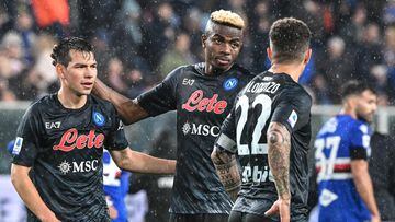 Napoli's Mexican forward Hirving Lozano (L) and Napoli's Nigerian forward Victor Osimhen react at the end of the Italian Serie A football match between Sampdoria and Napoli on January 8, 2023 at the Luigi-Ferraris stadium in Genoa. (Photo by Andreas SOLARO / AFP)