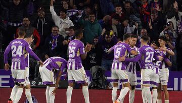 Valladolid's players celebrate after Barcelona's Danish defender Andreas Christensen scored an own goal during the Spanish league football match between Real Valladolid FC and FC Barcelona at the Jose Zorilla stadium in Valladolid on May 23, 2023. (Photo by CESAR MANSO / AFP)
