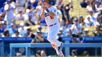 May 17, 2023; Los Angeles, California, USA; Los Angeles Dodgers catcher Will Smith (16) reaches home to score on bases loaded walk against the Minnesota Twins during the seventh inning at Dodger Stadium. Mandatory Credit: Gary A. Vasquez-USA TODAY Sports