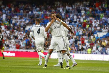 Benzema salutes the crowd.