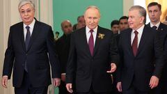Russian President Vladimir Putin, Kazakh President Kassym-Jomart Tokayev and Uzbek President Shavkat Mirziyoyev arrive for a working breakfast of the leaders of the Commonwealth of Independent States (CIS) in Moscow, Russia May 9, 2023. Sputnik/Vladimir Smirnov/Pool via REUTERS ATTENTION EDITORS - THIS IMAGE WAS PROVIDED BY A THIRD PARTY.