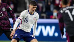 Nov 12, 2021; Cincinnati, Ohio, USA; United States forward Christian Pulisic (10) dribbles the ball while Mexico defender Luis Rodriguez (21) defends during a FIFA World Cup Qualifier soccer match at TQL Stadium. Mandatory Credit: Trevor Ruszkowski-USA TO
