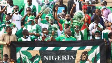 Nigeria supporters cheer before the Group D Africa Cup of Nations (CAN) 2021 football match between Nigeria and Egypt at Stade Roumde Adjia in Garoua on January 11, 2022. (Photo by Daniel BELOUMOU OLOMO / AFP)