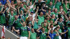 Niall McGinn of Northern Ireland celebrates scoring the 2-0 lead during the UEFA EURO 2016 group C preliminary round match between Ukraine and Northern Ireland at Stade de Lyon in Lyon, France, 16 June 2016.
 
 (RESTRICTIONS APPLY: For editorial news repo