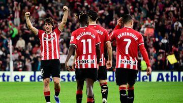 Athletic Bilbao's Spanish midfielder #30 Unai Gomez (L) and teammates react to their win at the end of the Spanish league football match between Athletic Club Bilbao and RC Celta de Vigo at the San Mames stadium in Bilbao on November 10, 2023. (Photo by ANDER GILLENEA / AFP)