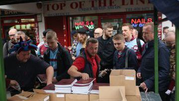 West Ham fans buy programmes near the Boleyn Ground. Tonights Premier League match against Manchester United is West Ham United's last game at the Boleyn Ground, bringing to an end 112 years of the club's history at the ground. The club will move into the