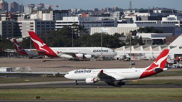 FILE PHOTO: FILE PHOTO: FILE PHOTO: FILE PHOTO: FILE PHOTO: Qantas planes are seen at Kingsford Smith International Airport in Sydney, Australia, March 18, 2020. REUTERS/Loren Elliott/File Photo/File Photo/File Photo/File Photo