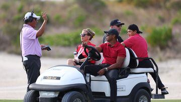 NASSAU, BAHAMAS - DECEMBER 03: Tiger Woods and Charlie Woods look on during the third round of the Hero World Challenge at Albany Golf Course on December 03, 2022 in Nassau, Bahamas.   Mike Ehrmann/Getty Images/AFP (Photo by Mike Ehrmann / GETTY IMAGES NORTH AMERICA / Getty Images via AFP)