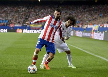 Arda Turan in action for Atleti in the Madrid derby