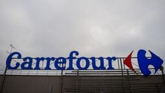 (FILES) this file photo taken on January 13, 2021 shows the logo of a French retail giant Carrefour surpermarket in Saint-Herblain, outside the city of Nantes. - French retail group Carrefour announced on June 5, 2021 it will file a complaint after one of