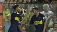 Boca Juniors&#039; forward Mauro Zarate (L) celebrates with teammates Cristian Pavon (C) and Julio Buffarini after scoring the team&#039;s second goal against Lanus during their Argentina First Division Superliga football match at La Bombonera stadium, in Buenos Aires, on February 17, 2019. (Photo by Alejandro PAGNI / AFP)