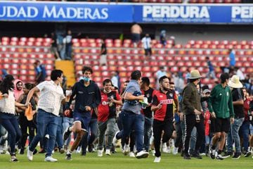 Five Mexican officials suspended over massive brawl among fans at soccer  match