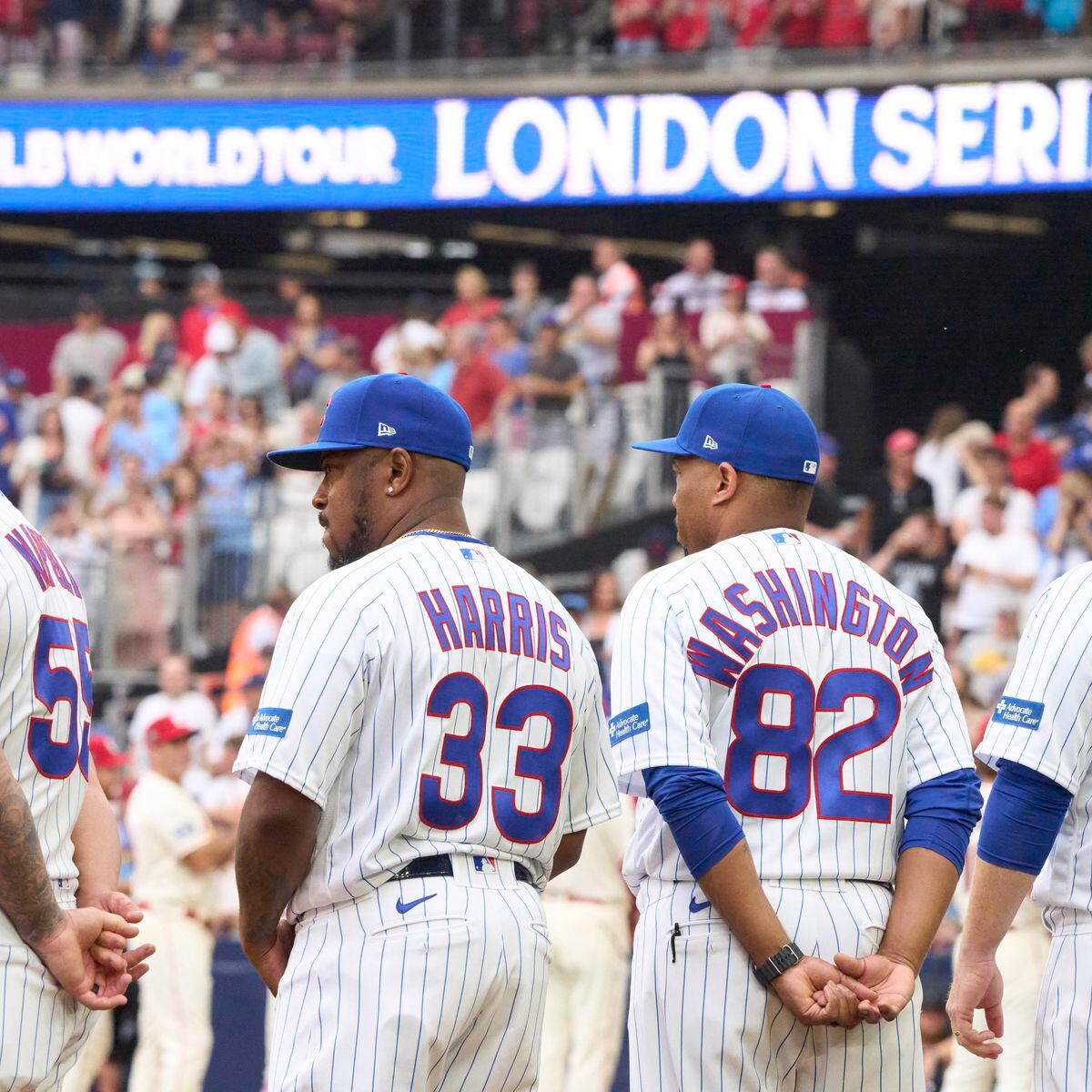 Chicago Cubs and the St. Louis Cardinals walk out into London Stadium