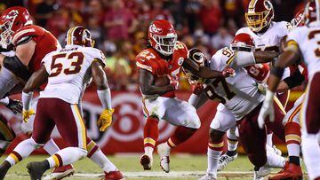 KANSAS CITY, MO - OCTOBER 2: Running back Kareem Hunt #27 of the Kansas City Chiefs makes a jump cut to try and avoid the tackle attempt of inside linebacker Zach Brown #53 of the Washington Redskins during the third quarter at Arrowhead Stadium on October 2, 2017 in Kansas City, Missouri. ( Photo by Jason Hanna/Getty Images ) == FOR NEWSPAPERS, INTERNET, TELCOS &amp; TELEVISION USE ONLY ==