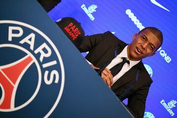 Paris Saint-Germain's new forward Kylian Mbappe speaks during a press conference on his presentation at the Parc des Princes stadium in Paris on September 6, 2017.