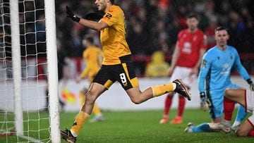 Wolverhampton Wanderers' Mexican striker Raul Jimenez scores the equalising goal during the English League Cup quarter-final football match between Nottingham Forest and Wolverhampton Wanderers at The City Ground in Nottingham, central England, on January 11, 2023. (Photo by Paul ELLIS / AFP) / RESTRICTED TO EDITORIAL USE. No use with unauthorized audio, video, data, fixture lists, club/league logos or 'live' services. Online in-match use limited to 120 images. An additional 40 images may be used in extra time. No video emulation. Social media in-match use limited to 120 images. An additional 40 images may be used in extra time. No use in betting publications, games or single club/league/player publications. / 