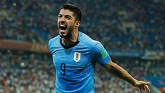 (FILES) Uruguay's forward Luis Suarez celebrates his teams win during the Russia 2018 World Cup round of 16 football match between Uruguay and Portugal at the Fisht Stadium in Sochi on June 30, 2018. The coach of the Uruguayan football team, Marcelo Bielsa, notified the reserve of the Celeste's historic scorer Luis Suarez for the next two games of the South American Qualifiers for the 2026 World Cup, the media reported on Tuesday October 31, 2023. The Argentine coach could thus summon Suarez for the double FIFA date in November, in which Uruguay will face Argentina on Thursday the 16th in Buenos Aires, and Bolivia, on Tuesday the 21st in Montevideo. (Photo by Odd ANDERSEN / AFP) / RESTRICTED TO EDITORIAL USE - NO MOBILE PUSH ALERTS/DOWNLOADS