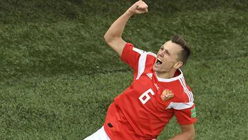 Russia&#039;s midfielder Denis Cheryshev celebrates scoring his team&#039;s second goal during the Russia 2018 World Cup Group A football match between Russia and Egypt at the Saint Petersburg Stadium in Saint Petersburg on June 19, 2018.  / AFP PHOTO / C