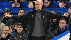 Manchester City's Spanish manager Pep Guardiola gestures on the touchline during the English Premier League football match between Chelsea and Manchester City at Stamford Bridge in London on November 12, 2023. (Photo by Glyn KIRK / IKIMAGES / AFP) / RESTRICTED TO EDITORIAL USE. No use with unauthorized audio, video, data, fixture lists, club/league logos or 'live' services. Online in-match use limited to 45 images, no video emulation. No use in betting, games or single club/league/player publications.