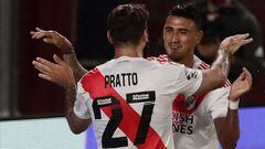 Argentina&#039;s River Plate forward Lucas Pratto (L), celebrates  with his teammate forward Matias Suarez, after scoring the team&#039;s second goal against Argentina&#039;s Rosario Central during their Argentina First Division 2020 Liga Profesional de Futbol tournament match at Libertadores de America stadium, in Avellaneda, Buenos Aires province, Argentina, on November 7, 2020. (Photo by ALEJANDRO PAGNI / POOL ARGRA / AFP)