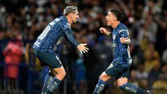 America's Alejandro Zendejas (R) celebrates with teamamte Diego Valdes after scoring againsts Pumas during their Mexican Apertura football tournament match between Pumas and America at the Olimpico stadium in Mexico City, on August 13, 2022. (Photo by RODRIGO ARANGUA / AFP)