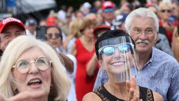 Supporters of Donald Trump listen as he promotes his support for the state of Florida during a campaign stop at Jupiter Inlet Lighthouse and Museum in Jupiter, Florida.