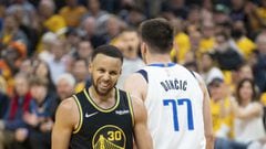 May 18, 2022; San Francisco, California, USA; Golden State Warriors guard Stephen Curry (30) celebrates against Dallas Mavericks guard Luka Doncic (77) during the third quarter in game one of the 2022 western conference finals at Chase Center. Mandatory C