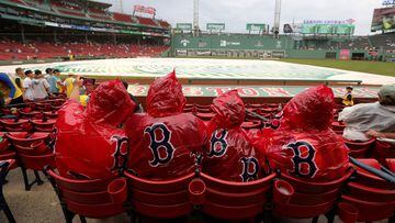 BOSTON, MASSACHUSETTS - JUNE 14: Boston Red Sox fans take a picture during a rain delay before a game between the Boston Red Sox and the Colorado Rockies at Fenway Park on June 14, 2023 in Boston, Massachusetts.   Paul Rutherford/Getty Images/AFP (Photo by Paul Rutherford / GETTY IMAGES NORTH AMERICA / Getty Images via AFP)