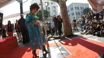 FILE PHOTO: Italian actor Gina Lollobrigida poses on her star after it was unveiled on the Hollywood Walk of Fame in Los Angeles, California, U.S., February 1, 2018. REUTERS/Mario Anzuoni/File Photo