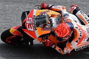 Repsol Honda Team's Spanish rider Marc Marquez takes a corner during the third MotoGP free practice at the Sepang International Circuit in Sepang on October 22, 2022, ahead of the Malaysian Grand Prix motorcycle race. (Photo by Mohd RASFAN / AFP)