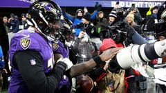 Quarterback Lamar Jackson #8 and offensive tackle Ronnie Stanley #79 of the Baltimore Ravens.