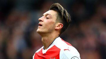 Mesut Ozil playing for Arsenal