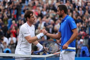 Murray (left) and Cilic shake hands after the Scot's last-four win.