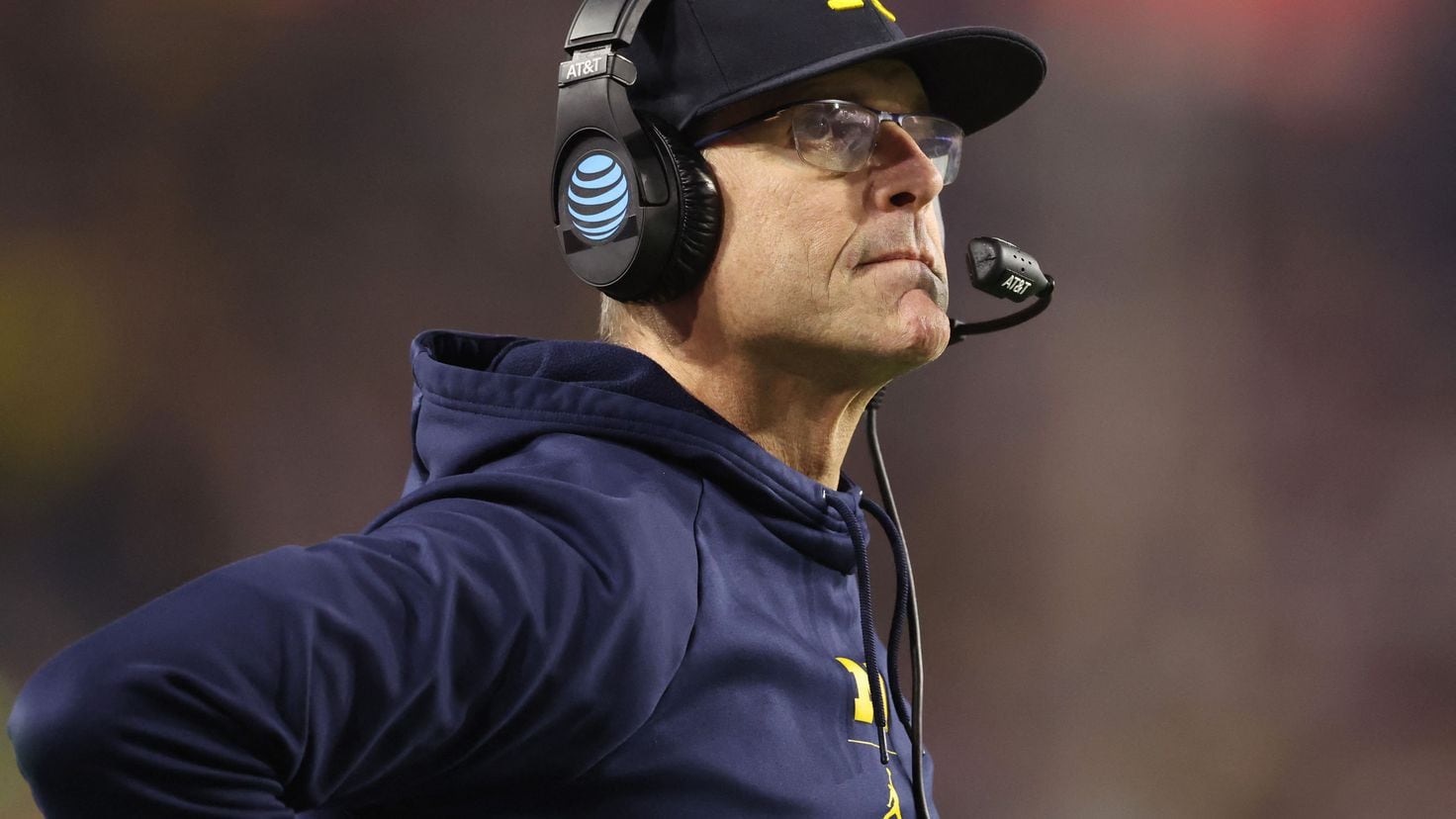 How much does Michigan Wolverines football coach Jim Harbaugh earn ...