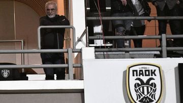 A picture taken on March 11, 2018, shows PAOK president Ivan Savvidis watching the Greek Superleague football match between PAOK Thessaloniki and AEK Athens at the Toumba Stadium in Thessaloniki. 