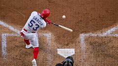 Jul 3, 2023; Arlington, Texas, USA; Texas Rangers right fielder Adolis Garcia (53) hits a home run against the Houston Astros during the seventh inning at Globe Life Field. Mandatory Credit: Jerome Miron-USA TODAY Sports