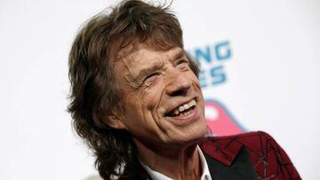 Mick Jagger of The Rolling Stones poses for photographers as the band arrives for the opening of the new exhibit "Exhibitionism: The Rolling Stones" in the Manhattan borough of New York City, U.S., November 15, 2016. REUTERS/Mike Segar/File Photo
