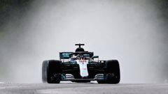 Hamilton leads Mercedes one-two at sodden Hungaroring