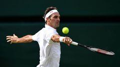 Switzerland&#039;s Roger Federer returns against Japan&#039;s Kei Nishikori during their men&#039;s singles quarter-final match on day nine of the 2019 Wimbledon Championships at The All England Lawn Tennis Club in Wimbledon, southwest London, on July 10, 2019. (Photo by Daniel LEAL-OLIVAS / AFP) / RESTRICTED TO EDITORIAL USE